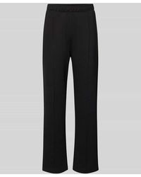 Champion - Sweatpants mit Längsnähten und Label-Stitching - Lyst