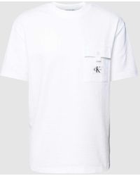 Calvin Klein - T-Shirt mit Brusttasche und Label-Patch - Lyst