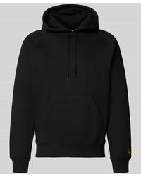 Carhartt - Hoodie mit Känguru-Tasche und Label-Stitching - Lyst