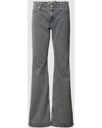 Tommy Hilfiger - Flared Jeans mit ausgefranstem Bund Modell 'SOPHIE' - Lyst