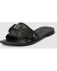 Guess - Slippers Met Labeldetail - Lyst