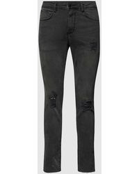 Review - Skinny Fit Jeans im Used-Look - Lyst