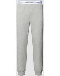 Calvin Klein - Sweatpants mit elastischem Logo-Bund Modell 'JOGGER' - Lyst