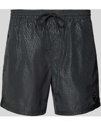 Guess - Badehose mit Logo-Muster - Lyst