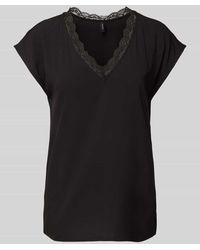 Vero Moda - Regular Fit Blusentop mit V-Ausschnitt Modell 'BELLA' - Lyst