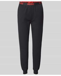 HUGO - Relaxed Fit Sweatpants mit elastischem Label-Bund Modell 'SPORTY' - Lyst