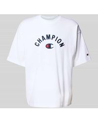 Champion - Relaxed Fit T-Shirt mit Label-Stitching - Lyst