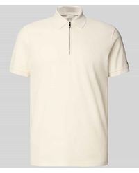 Tommy Hilfiger - Regular Fit Poloshirt aus reiner Baumwolle - Lyst