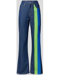 Victoria Beckham - Flared Fit Jeans mit Zierstreifen - Lyst