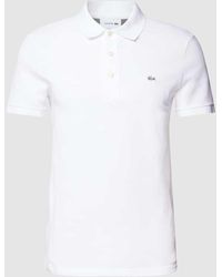 Lacoste - Slim Fit Poloshirt mit Label-Patch - Lyst