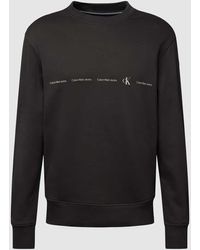 Calvin Klein - Sweatshirt mit Logo-Print Modell 'REPEAT' - Lyst