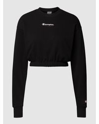 Champion Cropped Sweatshirt mit Brand-Applikation - Schwarz