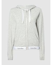 Training und Fitnesskleidung Hoodies Damen Bekleidung Sport- Calvin Klein Baumwolle Hoodie mit elastischem Logo-Saum in Weiß 