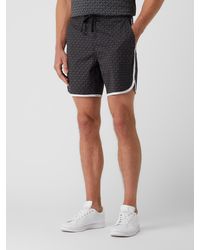 Heren Kleding voor voor Shorts voor Casual shorts Michael Kors Katoen Trainingsshorts Met Logopatch in het Zwart voor heren 