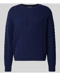 Review - Strickpullover mit Zopfmuster und Label-Stitching - Lyst