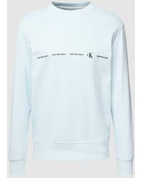 Calvin Klein - Sweatshirt mit Logo-Print Modell 'REPEAT' - Lyst