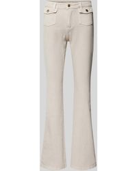 Guess - Flared Jeans mit aufgesetzten Pattentaschen Modell 'SEXY FLARE' - Lyst
