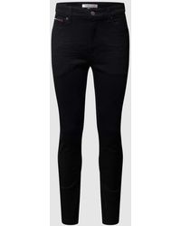 Tommy Hilfiger - Skinny Fit Jeans mit Stretch-Anteil Modell 'Simon' - Lyst