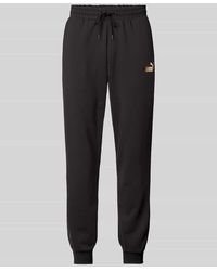 PUMA - Relaxed Fit Sweatpants Mit Label-Print - Lyst