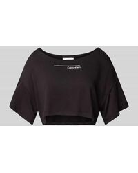 Calvin Klein - Cropped T-Shirt mit Label-Print Modell 'META LEGACY' - Lyst