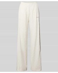 Guess - Straight Fit Sweatpants Mit Label-Stitching Modell 'Krissy' - Lyst