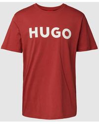 HUGO - T-Shirt mit Motiv-Print und Logo-Print sowie Regular Fit - Lyst