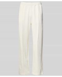 Champion - Sweatpants mit Längsnähten und Label-Stitching - Lyst