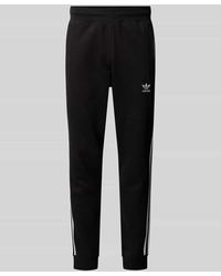 adidas Originals - Regular Fit Sweatpants mit Label-Stitching Modell '3-STRIPES' - Lyst