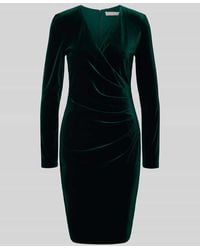 Christian Berg Cocktail - Knielanges Cocktailkleid mit V-Ausschnitt - Lyst