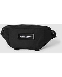 PUMA - Bauchtasche mit Label-Detail Modell ' Deck Waist Bag' - Lyst