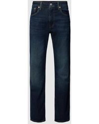 Levi's - Tapered Fit Jeans mit 5-Pocket-Design Modell "502 TAPER DARK INDIGO" - Lyst