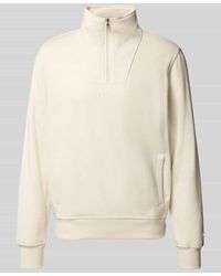 Champion - Troyer mit Logo-Stitching und Eingrifftaschen - Lyst