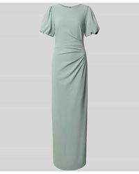 Swing - Abendkleid mit Rundhalsausschnitt und Puffärmeln - Lyst