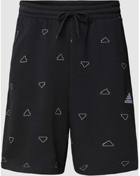 adidas - Shorts mit Allover-Label-Print - Lyst