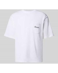 Review - T-Shirt mit Brusttasche und Label-Stitching - Lyst