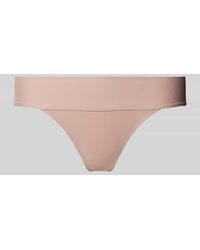 Triumph - String mit breitem Bandeau-Bund Modell 'Body Makeup Illusion' - Lyst