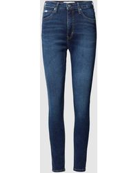 Calvin Klein - High Rise Skinny Fit Jeans Met Labeldetail - Lyst