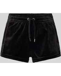 Juicy Couture - Shorts mit Reißverschlusstaschen Modell 'TAMIA' - Lyst