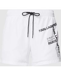 Heren Kleding voor voor Strandkleding voor Zwembroeken Karl Lagerfeld Synthetisch Zwembroek Met Logo in het Oranje voor heren 