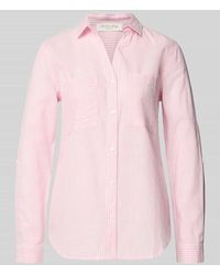 Christian Berg Women - Regular Fit Bluse mit V-Ausschnitt und Brusttaschen - Lyst