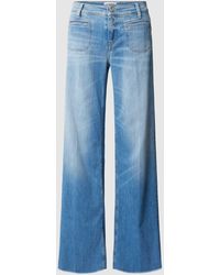 Cambio - Flared Jeans mit offenem Saum Modell 'TESS' - Lyst