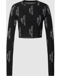 Calvin Klein - Korte Gebreide Pullover Met All-over Labelmotief - Lyst
