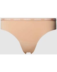 Guess - String mit elastischem Logo-Bund Modell 'DARCEY BRAZILIAN' - Lyst