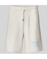 HUGO - Sweatshorts mit Label-Print Modell 'Nomario' - Lyst