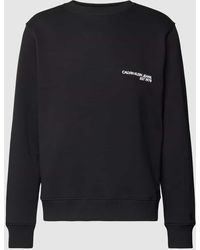 Calvin Klein - Sweatshirt mit Label-Motiv-Print auf der Rückseite Modell 'CK SPRAY' - Lyst