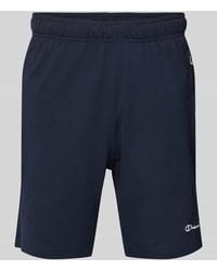 Champion - Relaxed Fit Bermudas mit Reißverschlusstaschen - Lyst