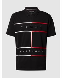 Tommy Hilfiger Regular Fit Poloshirt aus Bio-Baumwolle mit kontrastivem Print - Schwarz