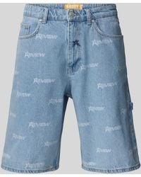 Review - Baggy Fit Jeansshorts mit Label-Print - Lyst
