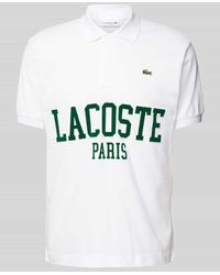 Lacoste - Classic Fit Poloshirt mit Label-Print Modell 'FRENCH ICONICS' - Lyst