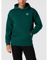 Heren Kleding voor voor Kleding voor sport PUMA PERFORMANCE Synthetisch Regular Fit Sweatshirt Met Logo in het Groen voor heren gym en workout voor Sweaters 